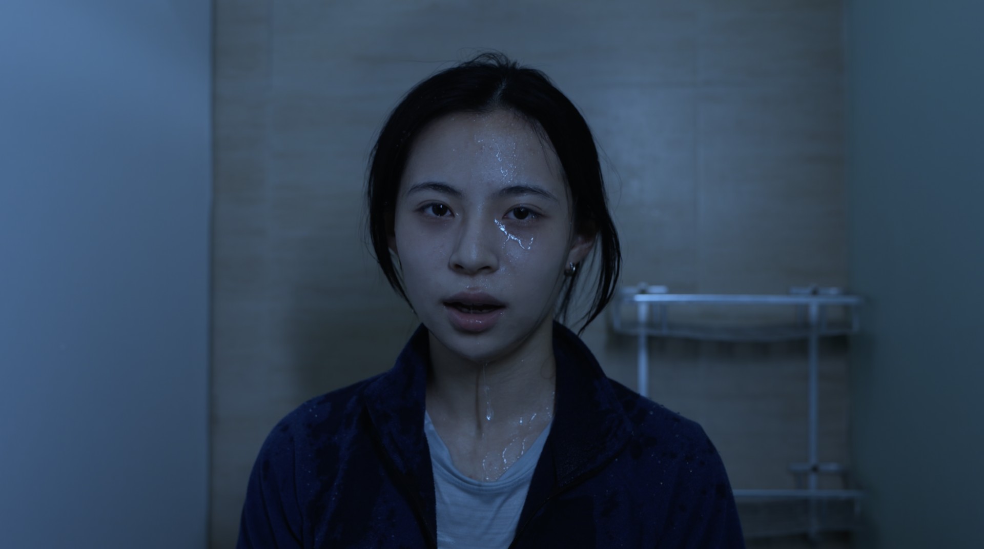 Ally with water on her face