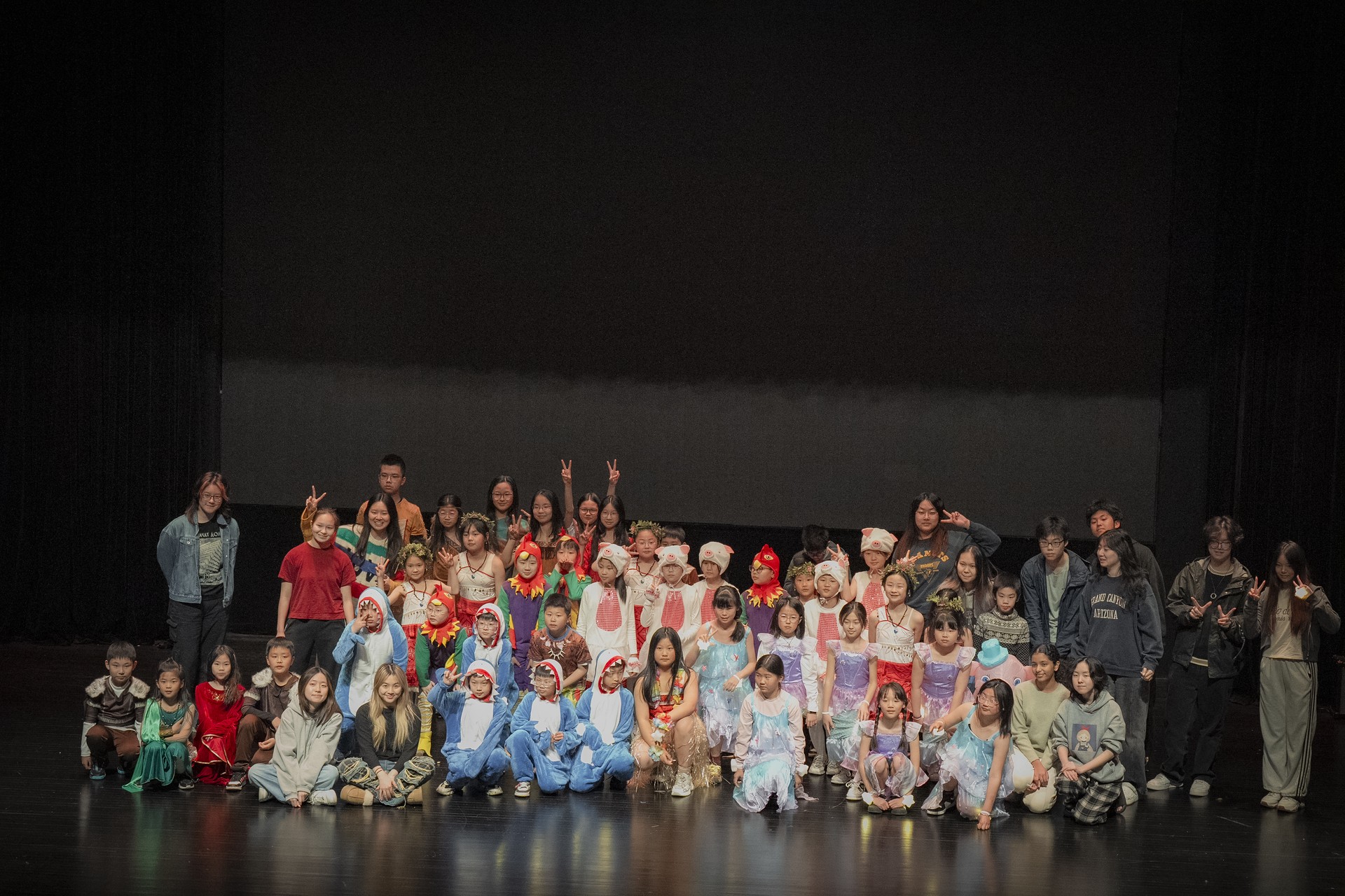 The musical cast together on stage
